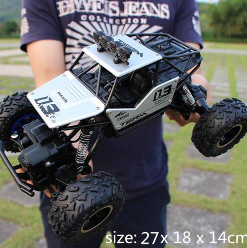 Explore any terrain with ease in this 4WD RC Car 2.4G Radio Control RC Cars Toys Buggy. This 2021 truck model features 4WD drivetrain for high speed and powerful off-roading capability. With durable construction, this remote control car is perfect for children of all ages.
